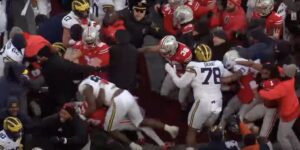 Players brawl after the November 30 Michigan-Ohio State football game. Clip WBNS 10TV.